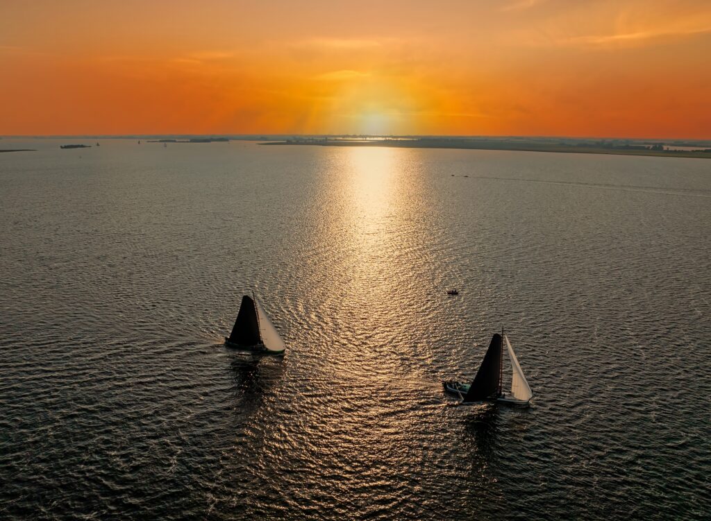 Aerial,From,Traditional,Skutsjessilen,On,The,Heegermeer,In,Friesland,The